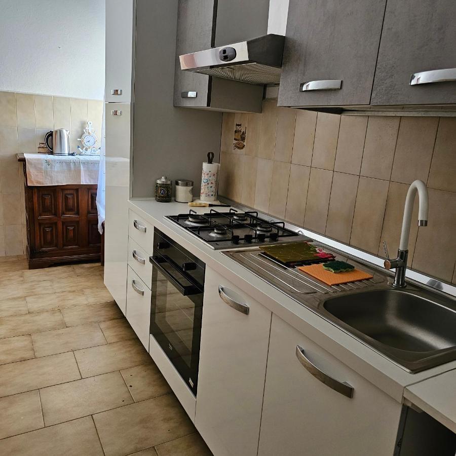 Appartamento A Telti Con Giardino Privato E Posto Auto Exterior foto